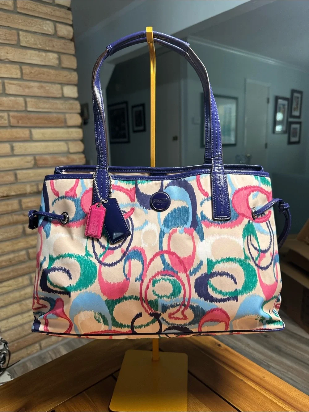 Coach Ikat Carryall in multi colored C print and navy patent trim